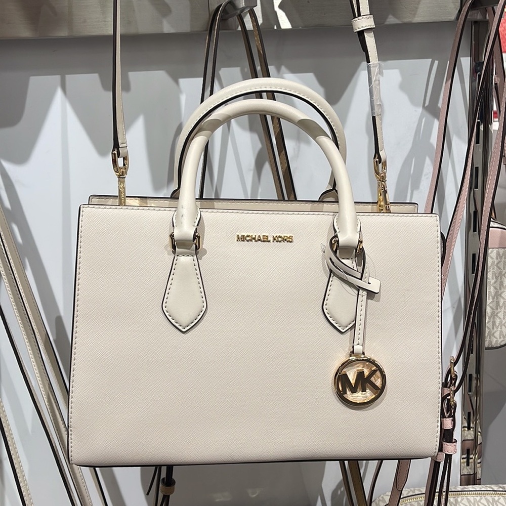 Michael Kors Sheila Medium Center Zip Satchel Crossbody Bag
Light Cream
NWT - Picture 5 of 16